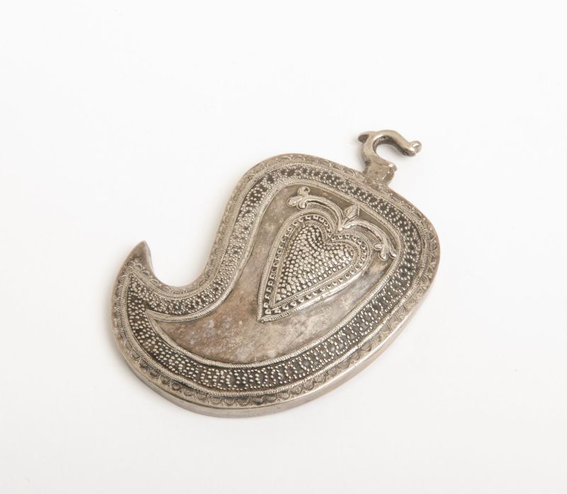 Part of a belt buckle