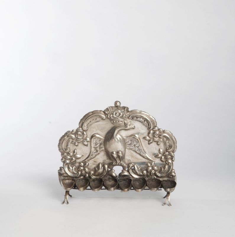 Hanukkah lamp with spread-winged eagle