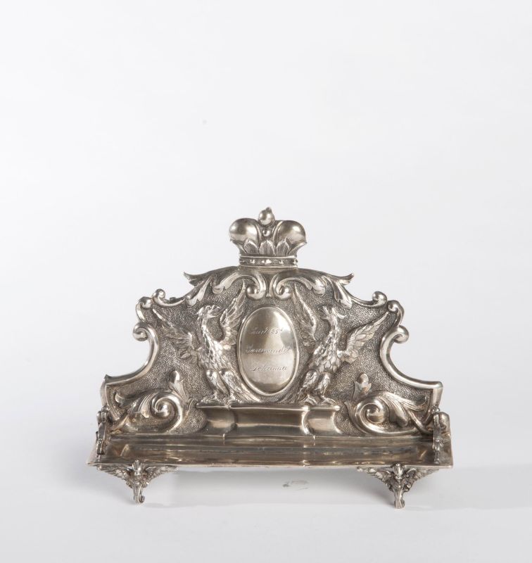 Crowned Hanukkah lamp with dedicatory inscription flanked by eagles