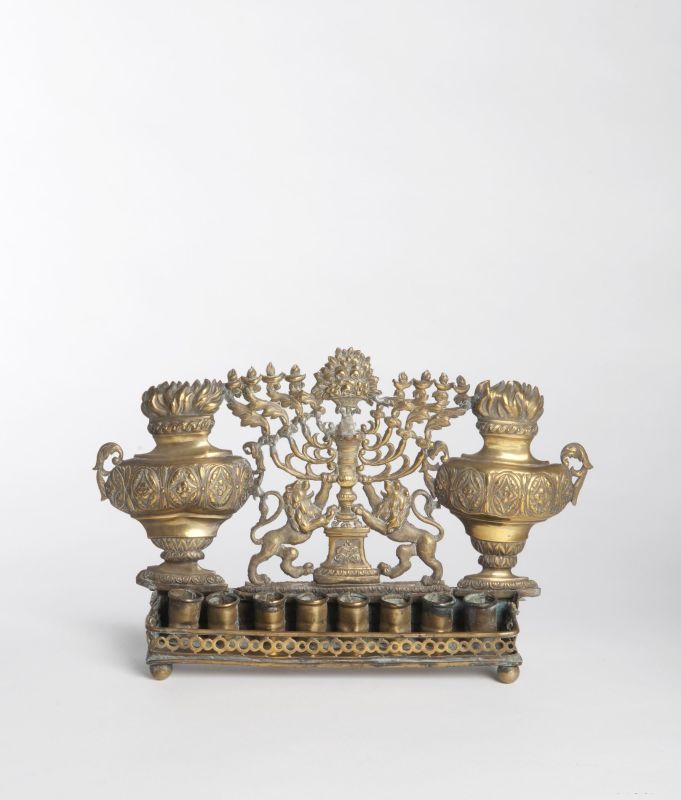 Hanukkah lamp with menorah and large amphoras