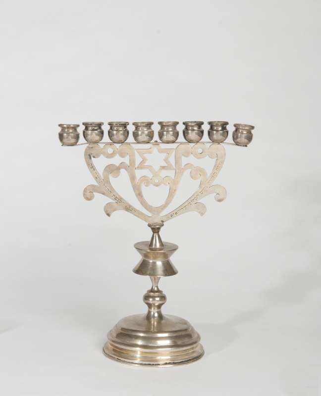 Small standing Hanukkah lamp with dedicatory inscription