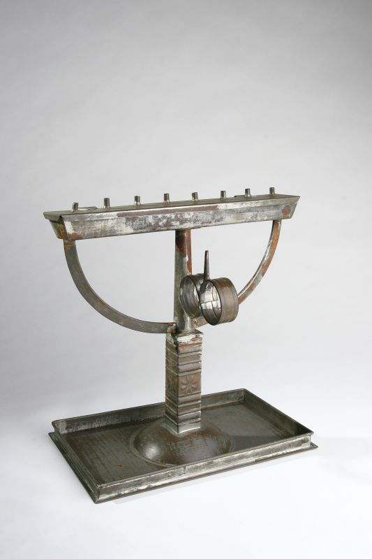 Standing tin Hanukkah lamp