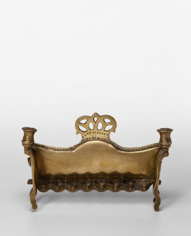 Hanukkah lamp shaped like sofa in Empire style