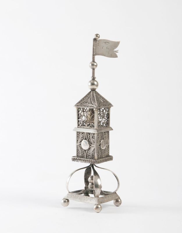 Tower-shaped spicebox with the names of the owners