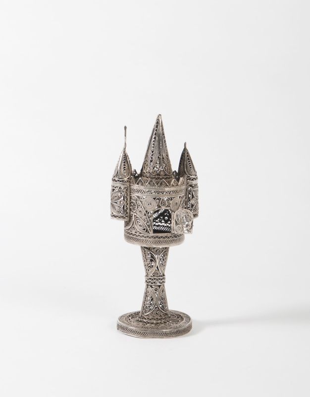 Tower-shaped spicebox encircled by turrets