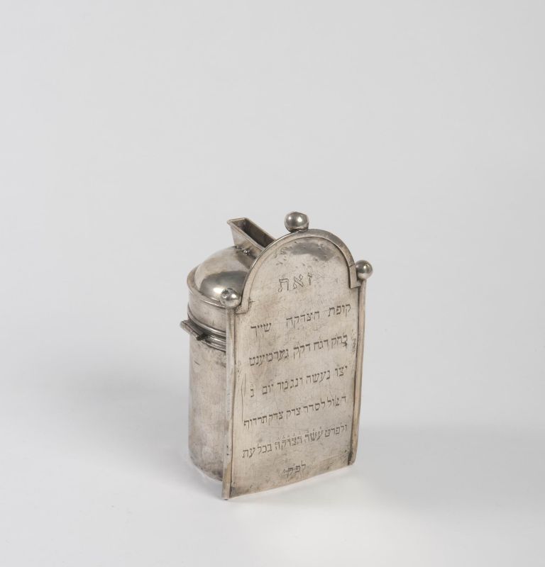 Tombstone-shaped Burial Society charity box with inscription