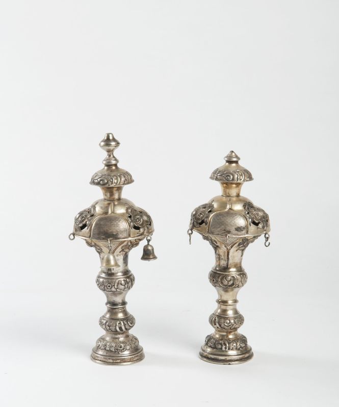 Torah finials decorated with roses in high relief