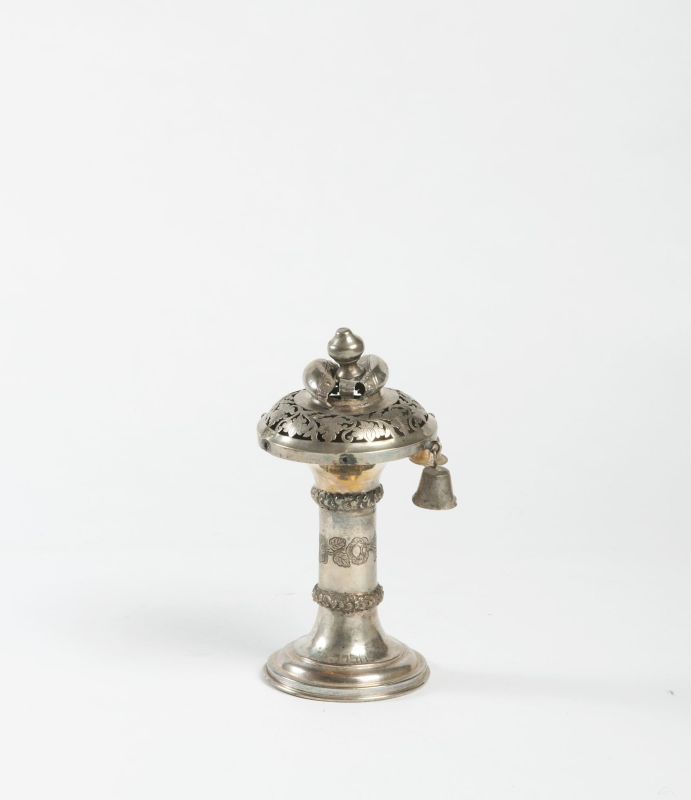 Charity Society Torah finial decorated with vegetal motifs and a Hebrew inscription