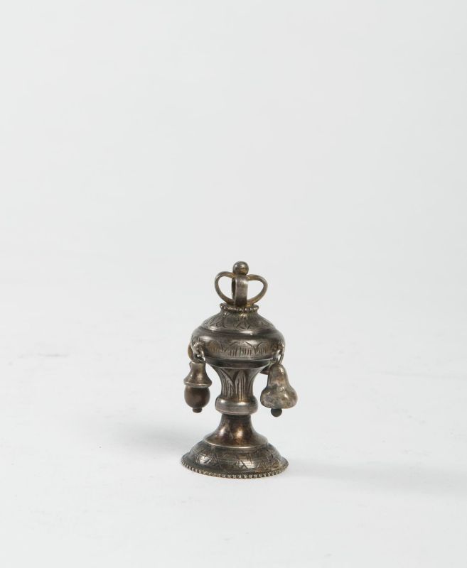 Miniature Torah finial decorated with crown and bells