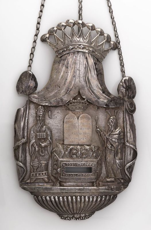 Torah shield adorned with depictions of Moses, Aharon and angels