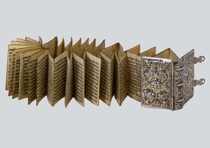 Esther scroll, folded and bound in a silver book binding