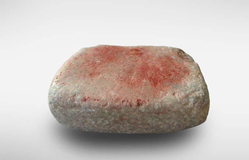 Stone for crushing ocher