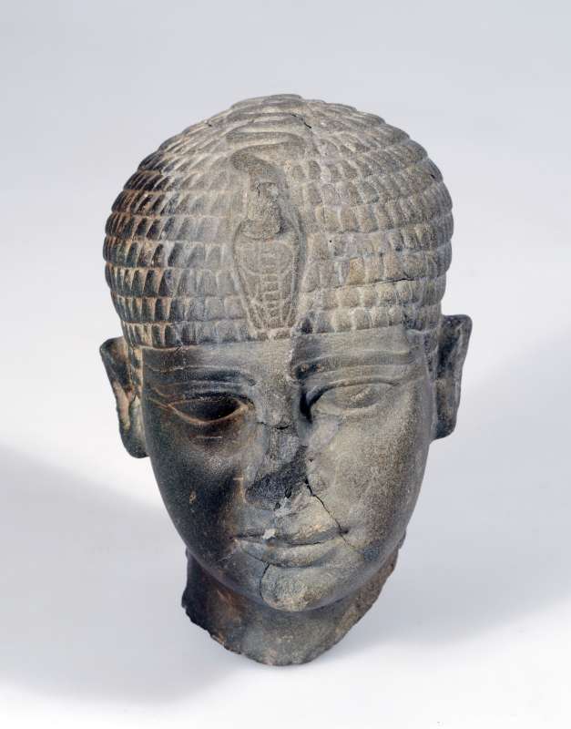 Head of an Egyptian king, originally inlaid, part of a figurine imported from Egypt