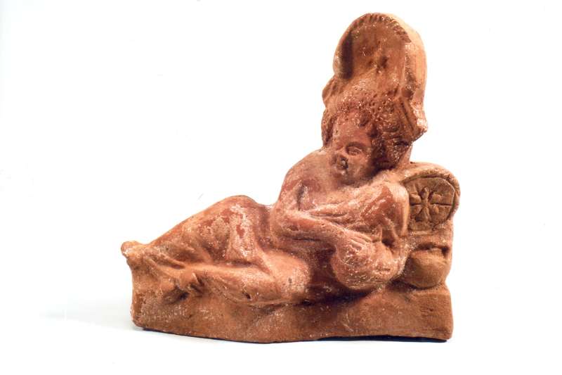 Figurine of reclining Harpocrates with a vessel