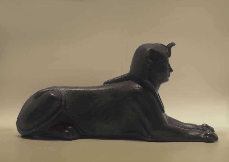 Statuette of a sphinx wearing the <i>nemes</i> headcloth and <i>uraeus</i>