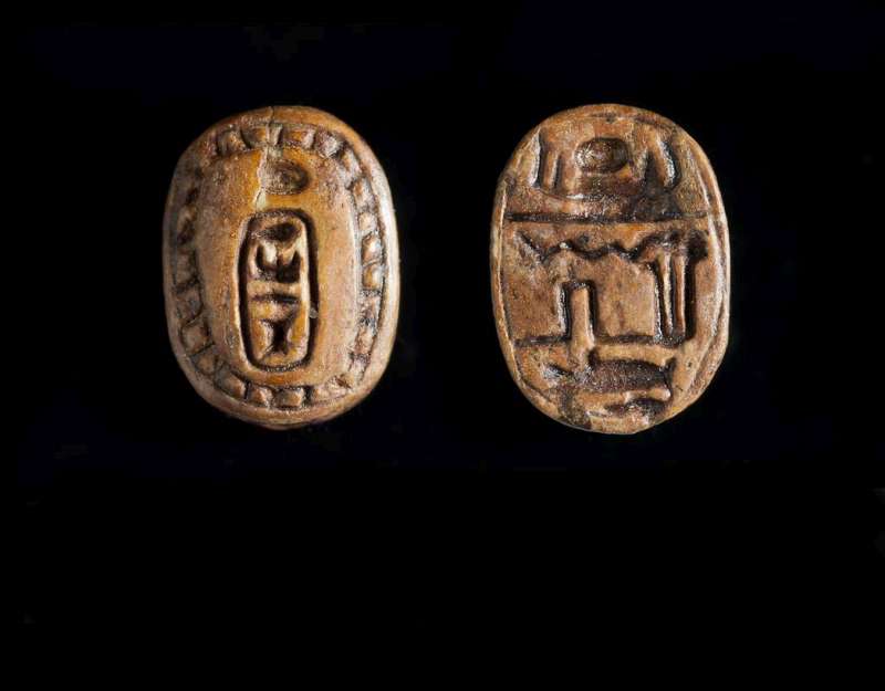 Oval plaque bearing the name of Thutmose III on one side, and a blessing: 