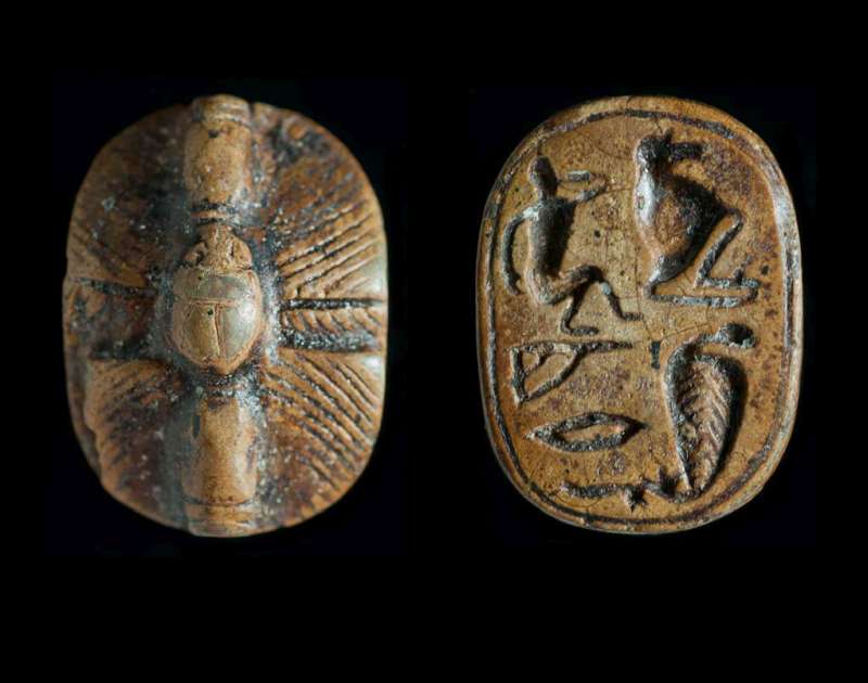 Design amulet depicting a small scarab, and inscribed with a blessing invoking the god Thoth