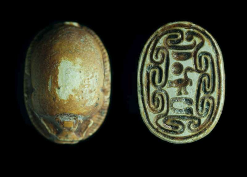 Scarab depicting hieroglyphs suggesting a modern forgery