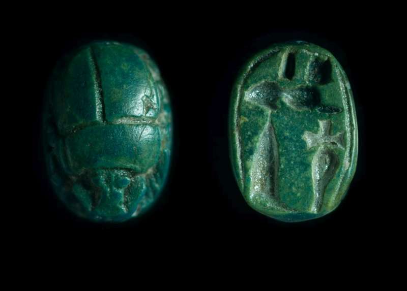 Scarab depicting a reclining sphinx above a 