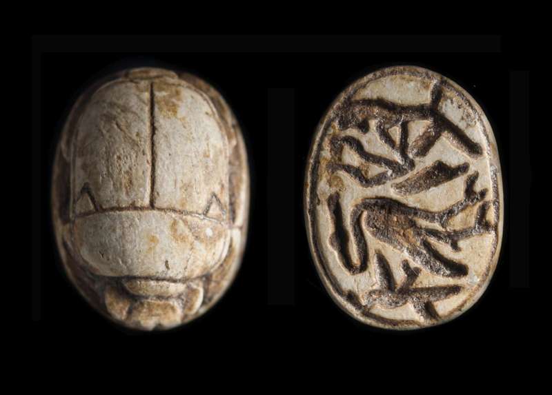 Scarab depicting a kneeling king in adoration before the heron