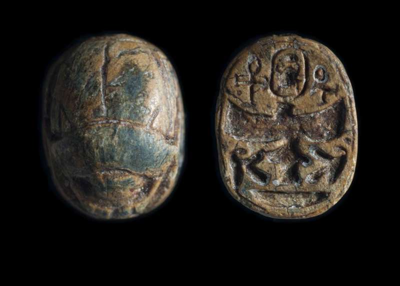Scarab depicting a winged falcon, flanked by a good-luck protective signs