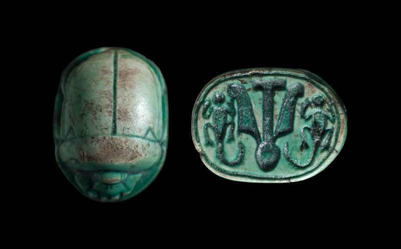 Scarab depicting a central 