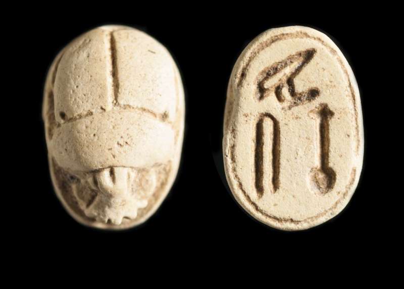 Scarab displaying three hieroglyphs, possibly comprising a blessing