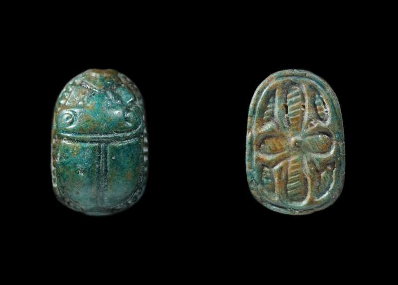 Scarab decorated with a floral cross pattern and lozenge-like motifs