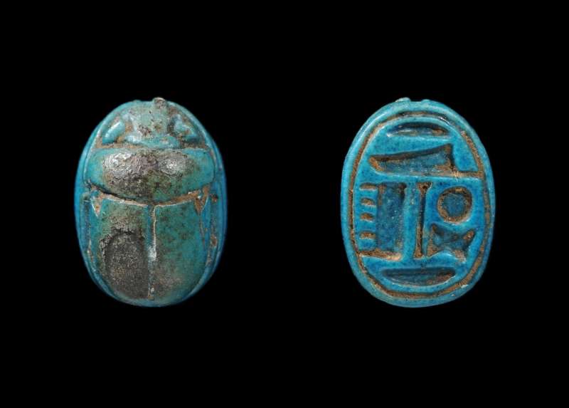 Scarab bearing the name of the god Amun-Re flanked by 