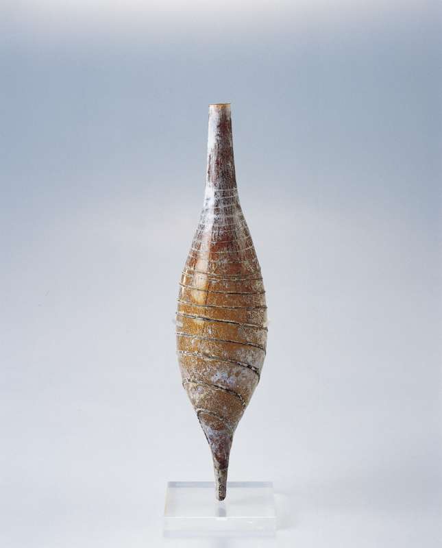 Bottle with white trail-decoration