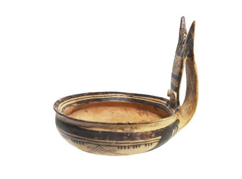 Bowl with figurative handle
