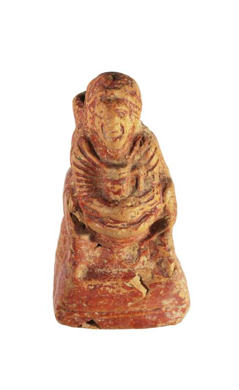 Figurine of a drunken old woman clasping a <i>lagynos</i> (wine jar)
