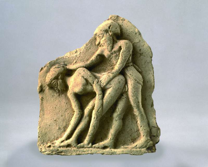 Plaque depicting a copulating couple