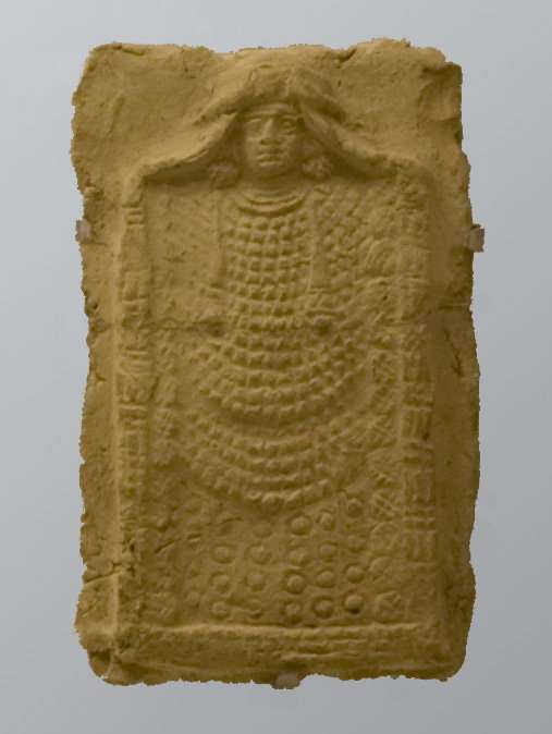 Plaque depicting a richly dressed goddess lying on a wedding(?) bed, probably Ishtar, the goddess of love and war