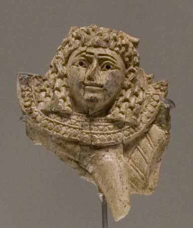 Plaque depicting the face of an Aramaean female sphinx