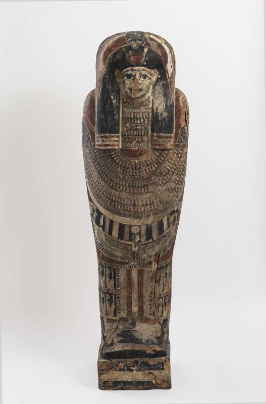 Child’s coffin decorated with a scarab at the top, the protecting figure of the sky goddess Nut in the center, and deities from the realm of the dead below