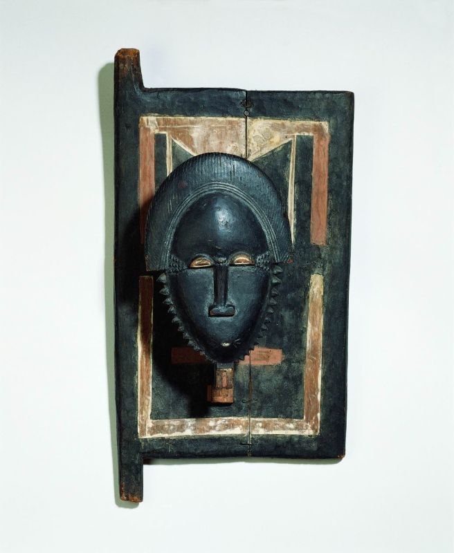 House or granary window shutter with carving of an ancestor's head