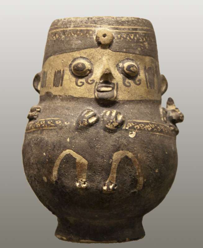 Bottle in the form of a nobleman carrying a baby llama on his shoulders
