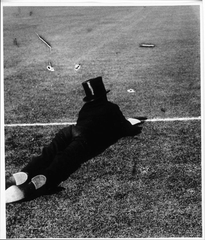 Eton Boy Watching Cricket