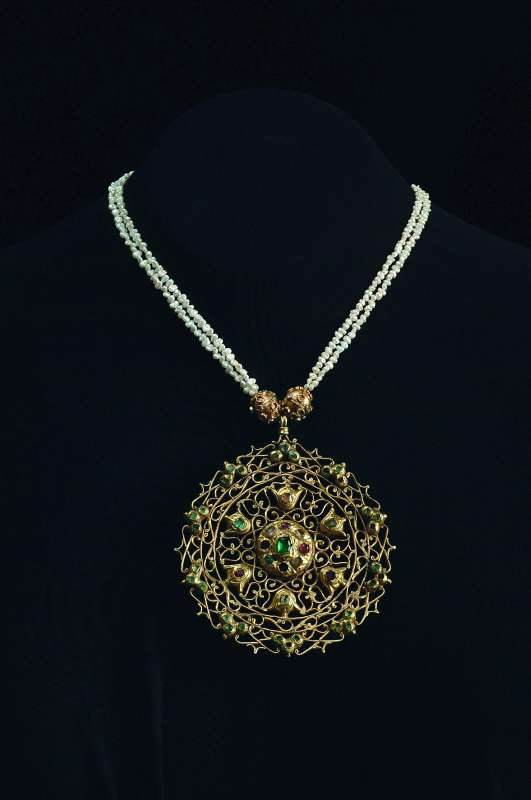 Pendant from the <i>tazra</i> necklace
