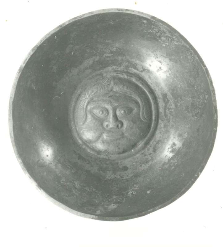 Bowl decorated with a female face probably representing a goddess