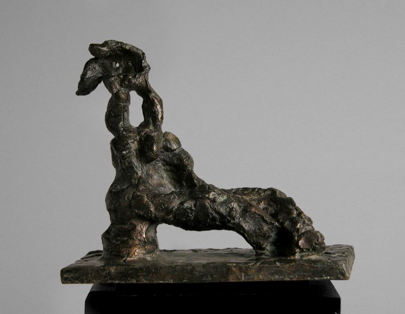 Reclining Woman on a Puff